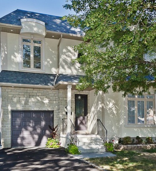 Redefining Tradition: Two-Story Modernization of a Bungalow